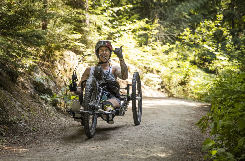 An adaptive mountain bike rider on the Flashback Trail in Whistler's Cheakamus neighbourhood.
