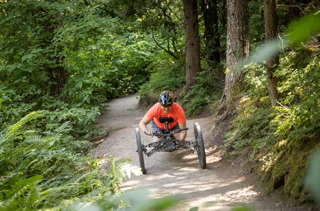 An adaptive mountain bike rider on the Flashback Trail in Whistler's Cheakamus neighbourhood.