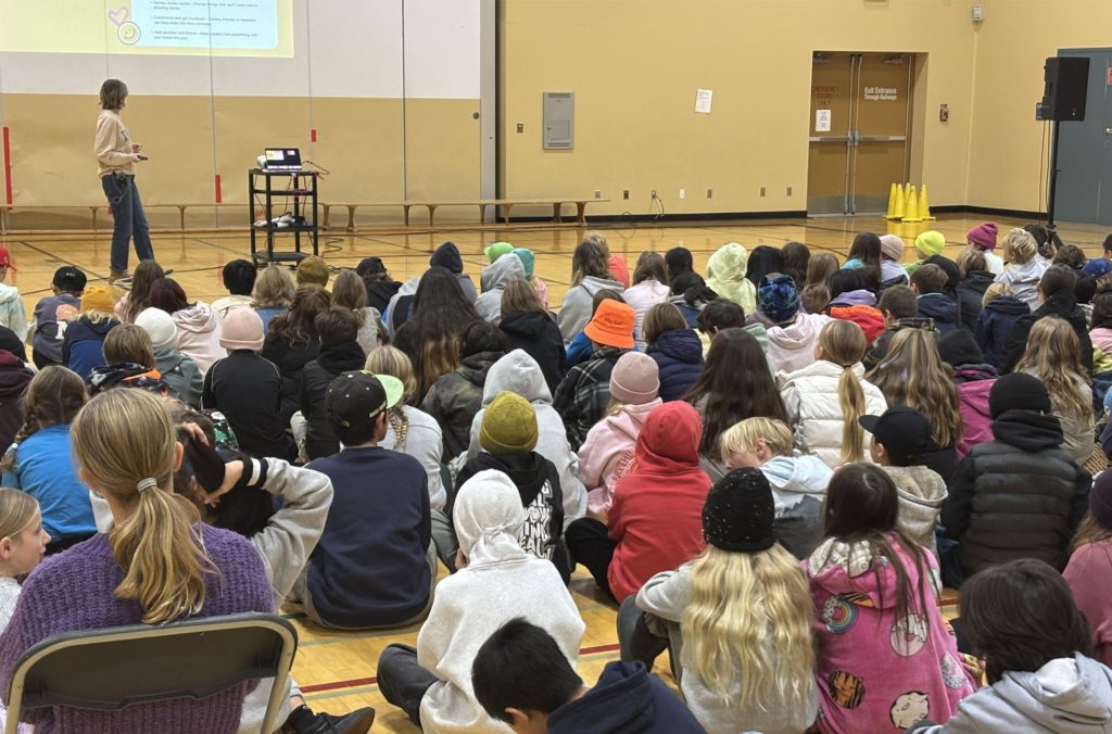 An author presents at the Authors in Schools program, which is part of the Whistler Writers Festival.