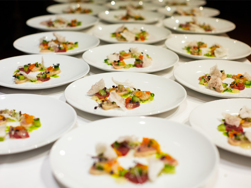 Gourmet tasting dishes plated for the Cornucopia 30th Anniversary Dinner in Whistler.