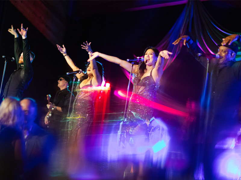 Live band performs on stage at the Cornucopia 30th Edition Gala in Whistler.
