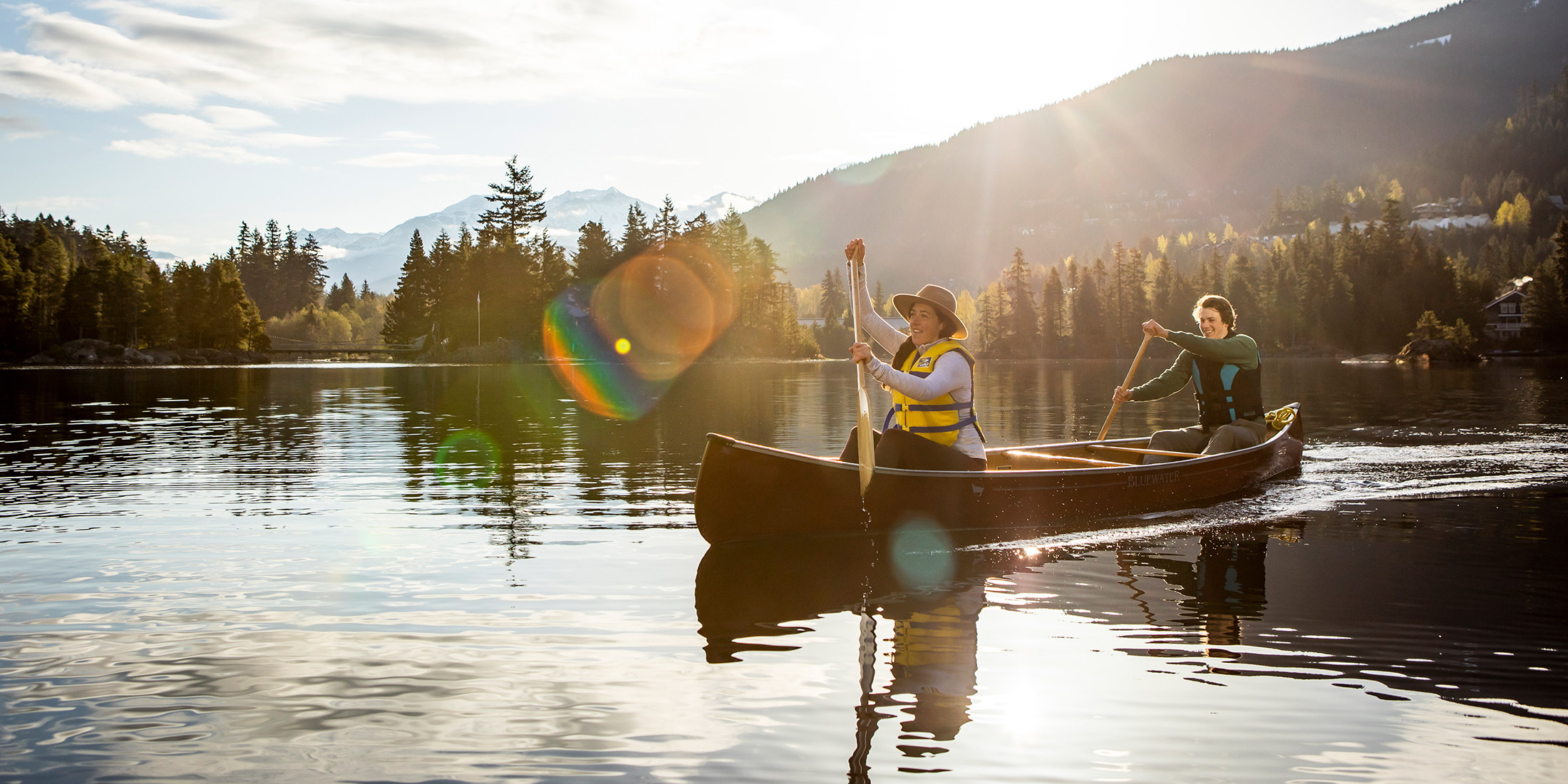 People canoeing on Alpha Lake in Whistler