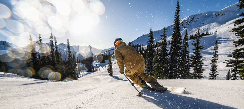 A skier on a freshly groomed run at Whistler Blackcomb