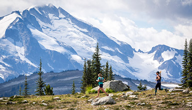 Runners conquering the Fitzimmons Mountain range in Whistler British Columbia
