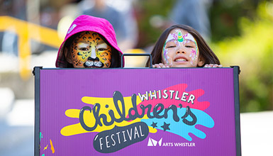 Entertainer and child at the Whistler Children's Festival