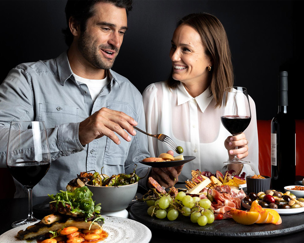 People tasting delicous wine and food at Whistler Cornucopia in November