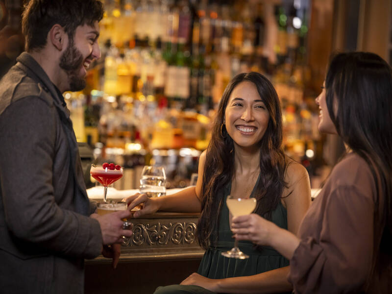 People having late-night drinks at Bearfoot Bistro bar in Whistler