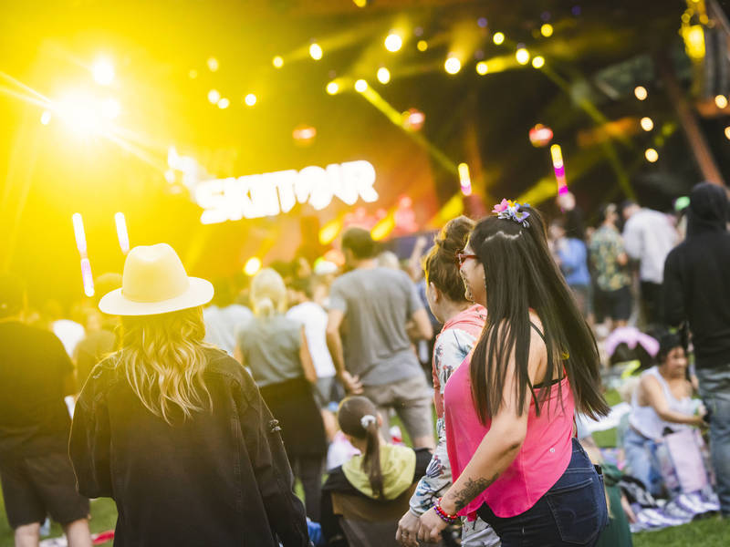 People dancing at a live music concert in Whistler Village