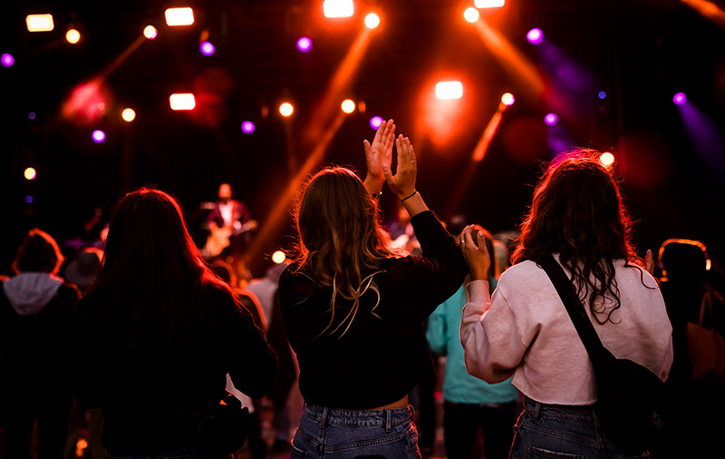 People enjoying live music at a concert in Whistler