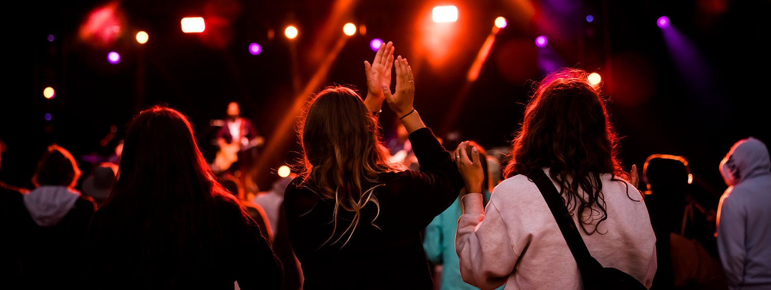 People enjoying live music at a concert in Whistler