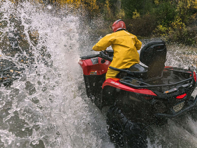 An ATV rider travels through rugged forest trails in the Callaghan Valley during the Call of the Wild ATV Tour.