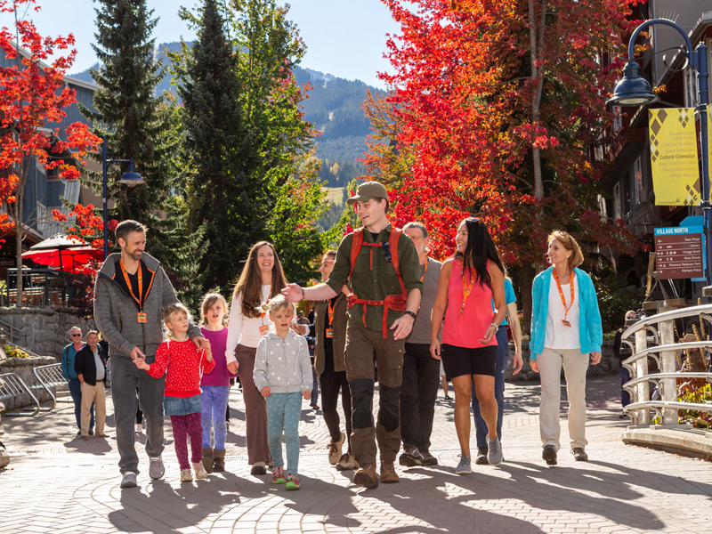 Visitors explore Whistler Village on a guided walking tour, discovering public art, local history and cultural landmarks.