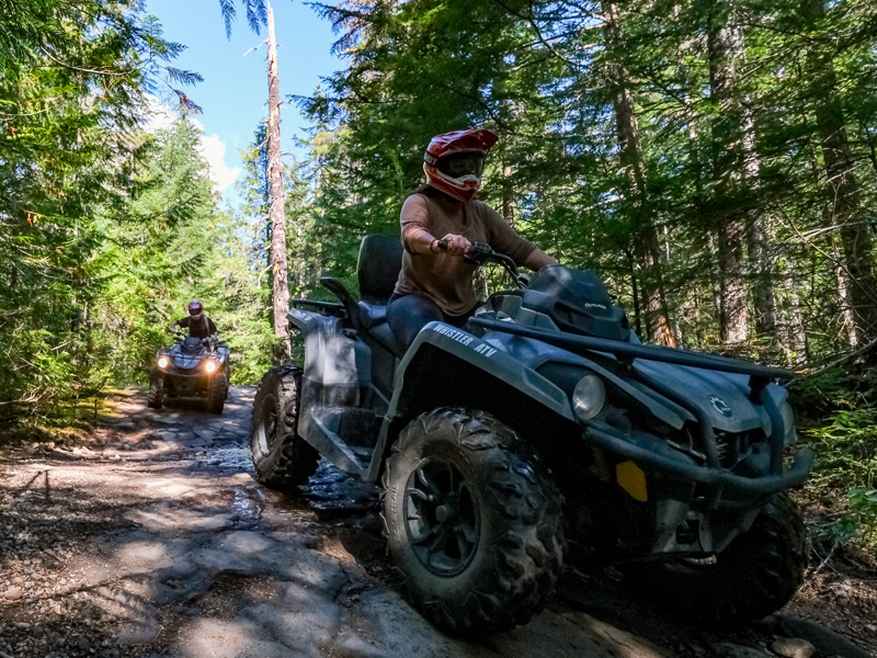 A private group explores Whistler's backcountry on ATVs with a dedicated guide.