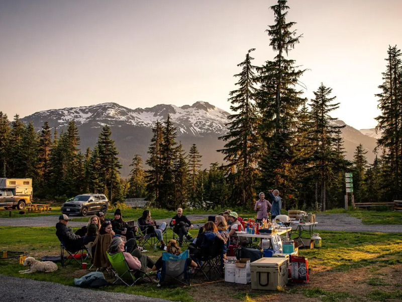 RV and tent campsites at Whistler Olympic Park surrounded by forest and mountain views.