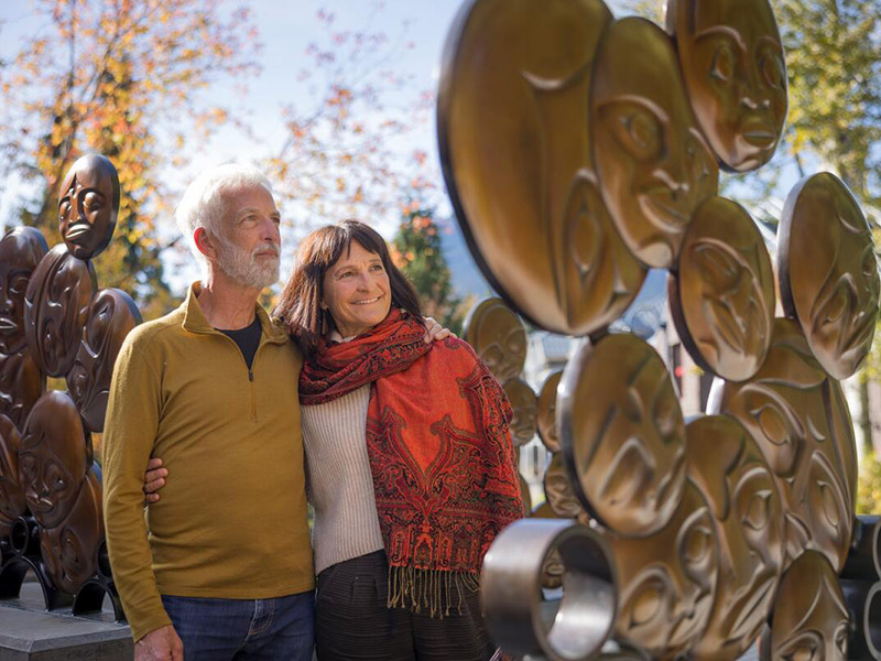 Couple exploring the Cultural Connector in Whistler, British Columbia.