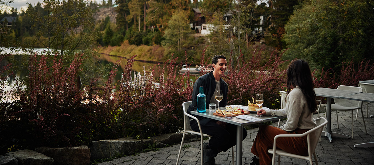A group of people enjoying a meal at a restaurant