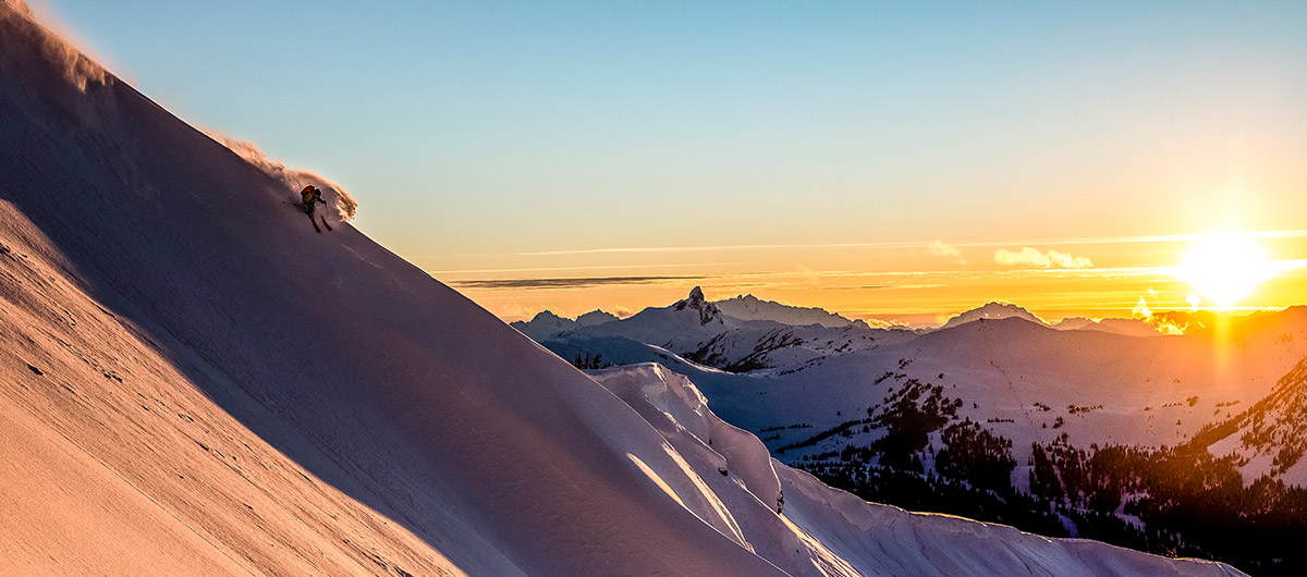 Skier on Whistler mountain at sunrise