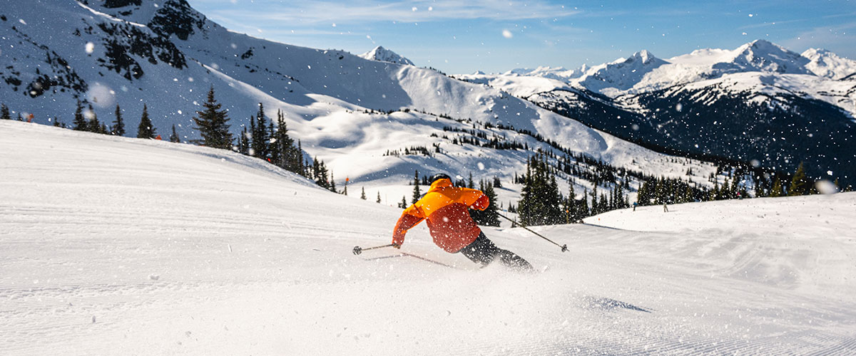 Skier getting fresh tracks on Whistler