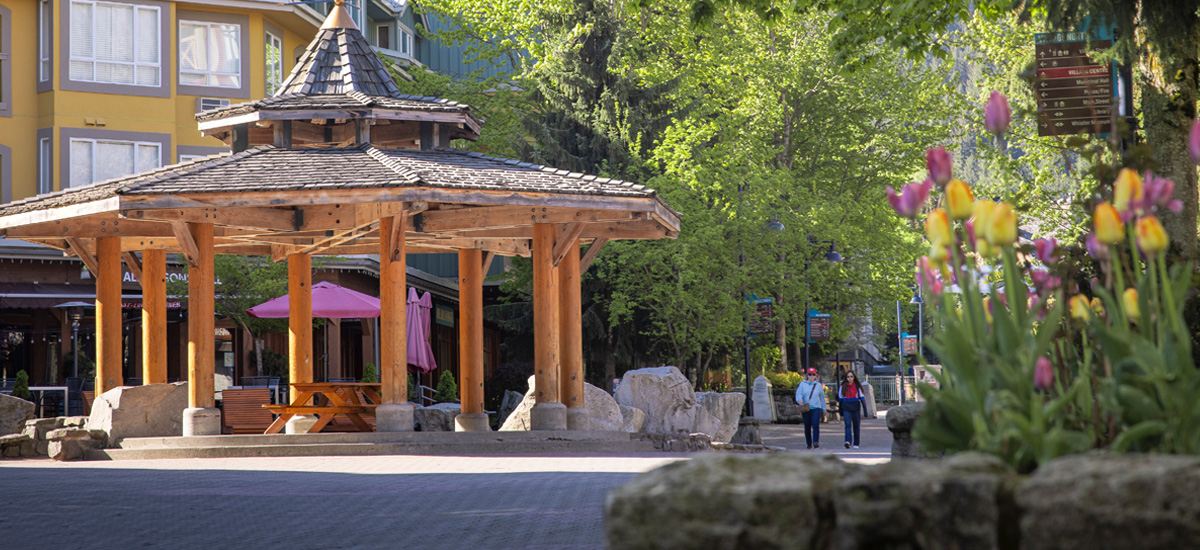 Two people enjoying the steaming hot baths at Scandinave Spa in Whistler