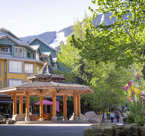 Two people enjoying the steaming hot baths at Scandinave Spa in Whistler