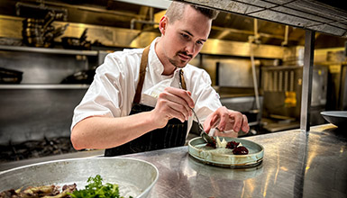 A chef preparing food in Whistler