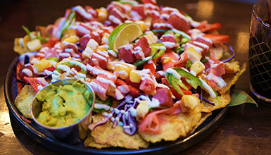 A loaded plate of nachos at apres in Whistler