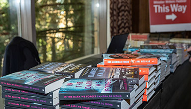 Stack of books on a table at Whistler Writers Festival