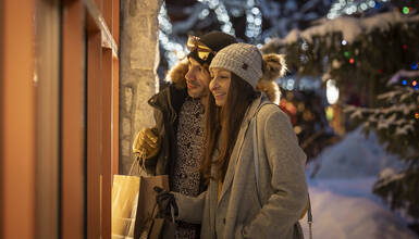 A couple window shopping in Whistler Village