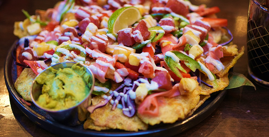 A fresh and loaded plate of nachos