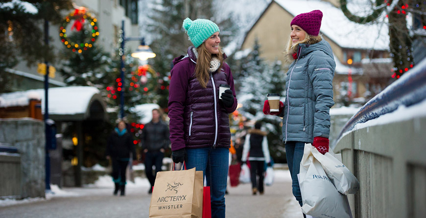 People shopping in Whistler Village during the holidays